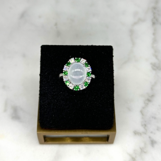 Icy Jadeite Cabochong Ring With Tsavorite and Diamond Halo