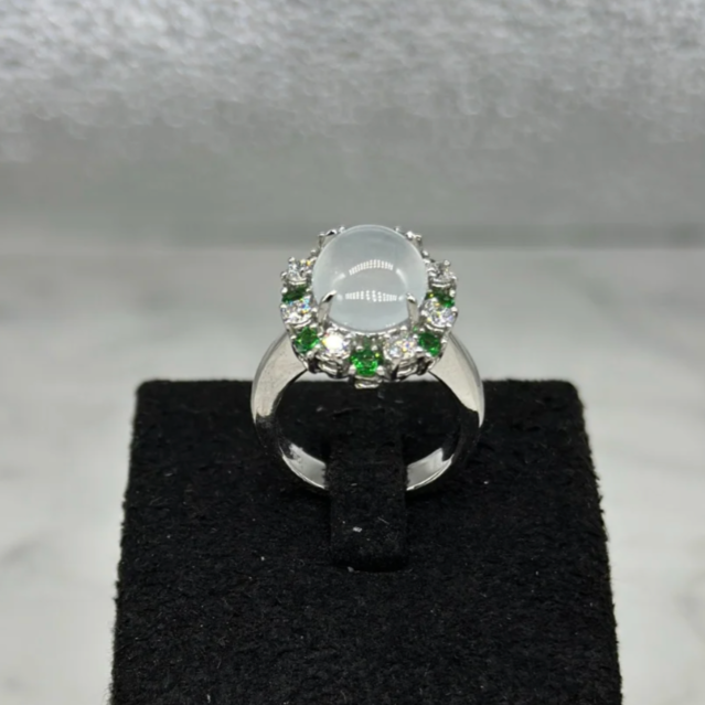 Icy Jadeite Cabochong Ring With Tsavorite and Diamond Halo