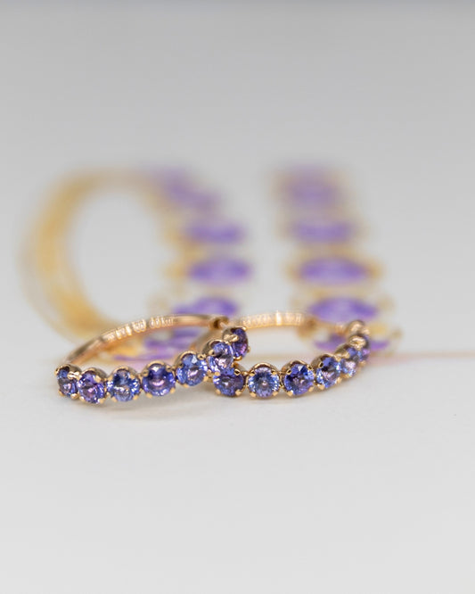 Tanzanite halo hoop earrings by Stefania's Stones and METIER Origine Collection